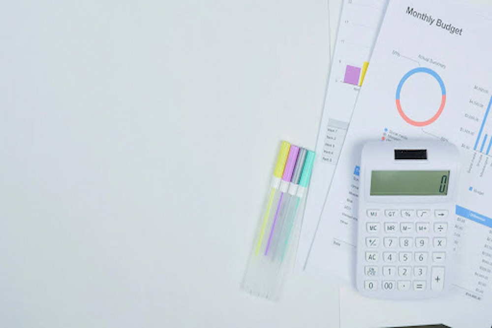paperwork and calculator referring to the UK Budget 2024
